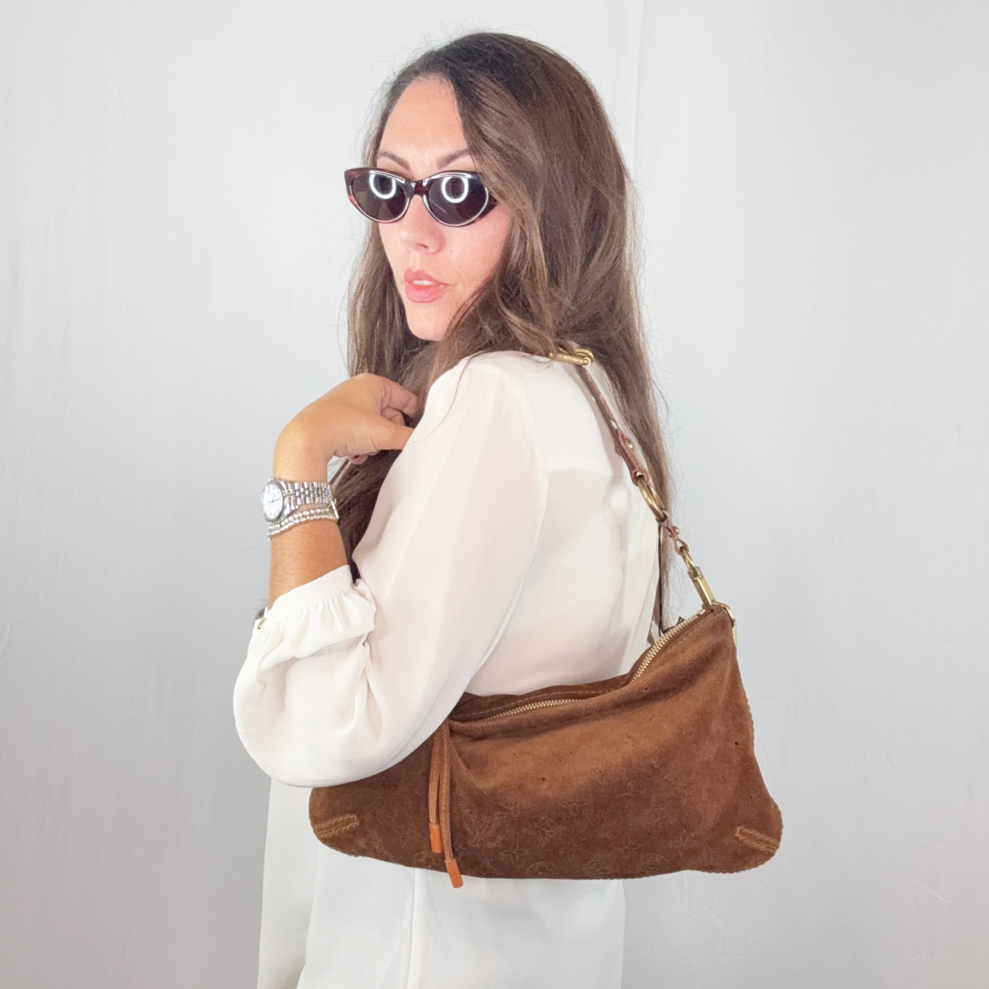 Louis Vuitton Braune Monogramm-Umhängetasche Onatah PM aus perforiertem Wildleder