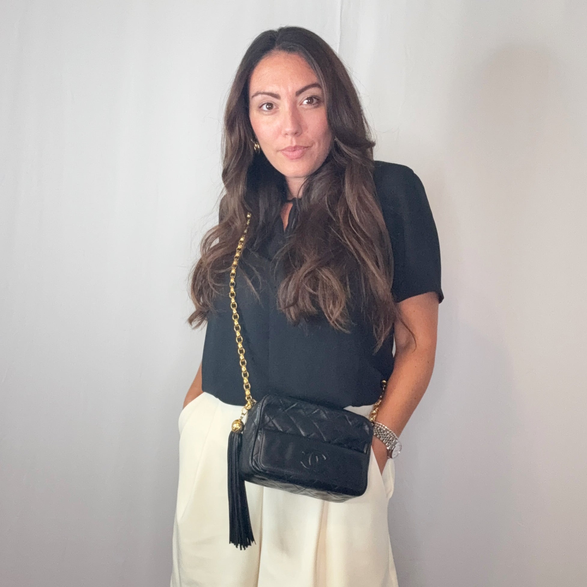 Chanel Vintage – Umhängetasche mit Kameraquaste aus gestepptem Leder in Schwarz