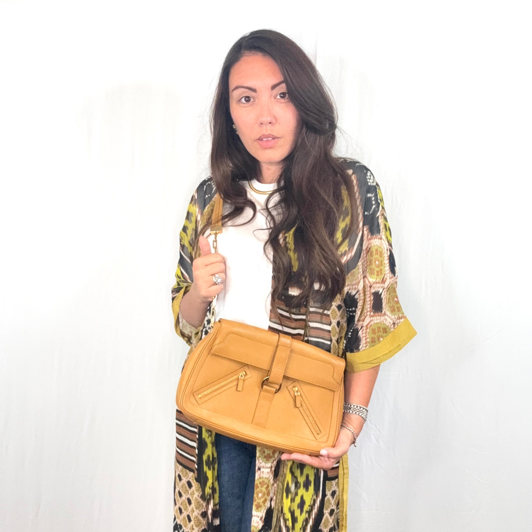 Borsa a tracolla Gucci in pelle beige con tasche con cerniera