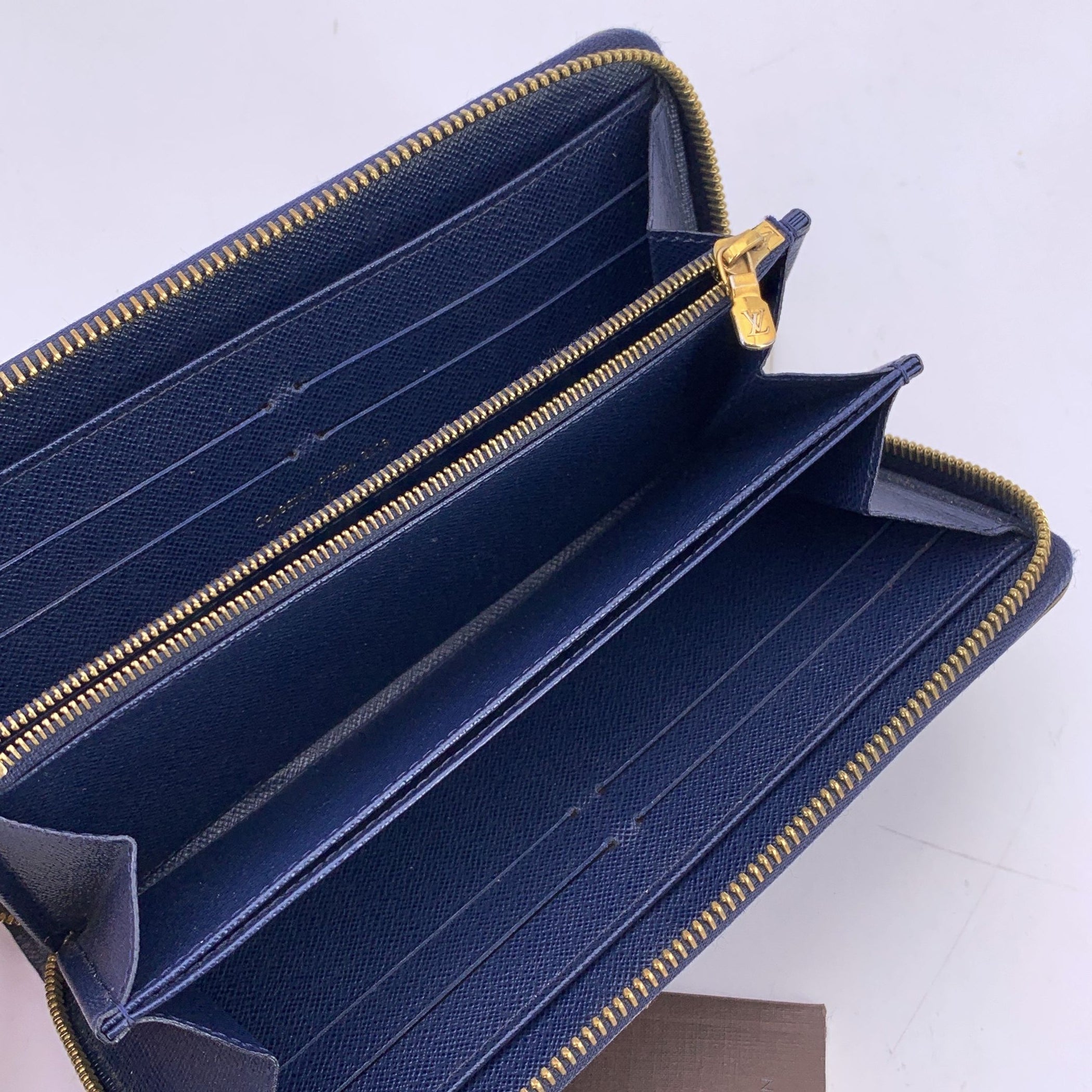 LOUIS VUITTON Wallets Zippy