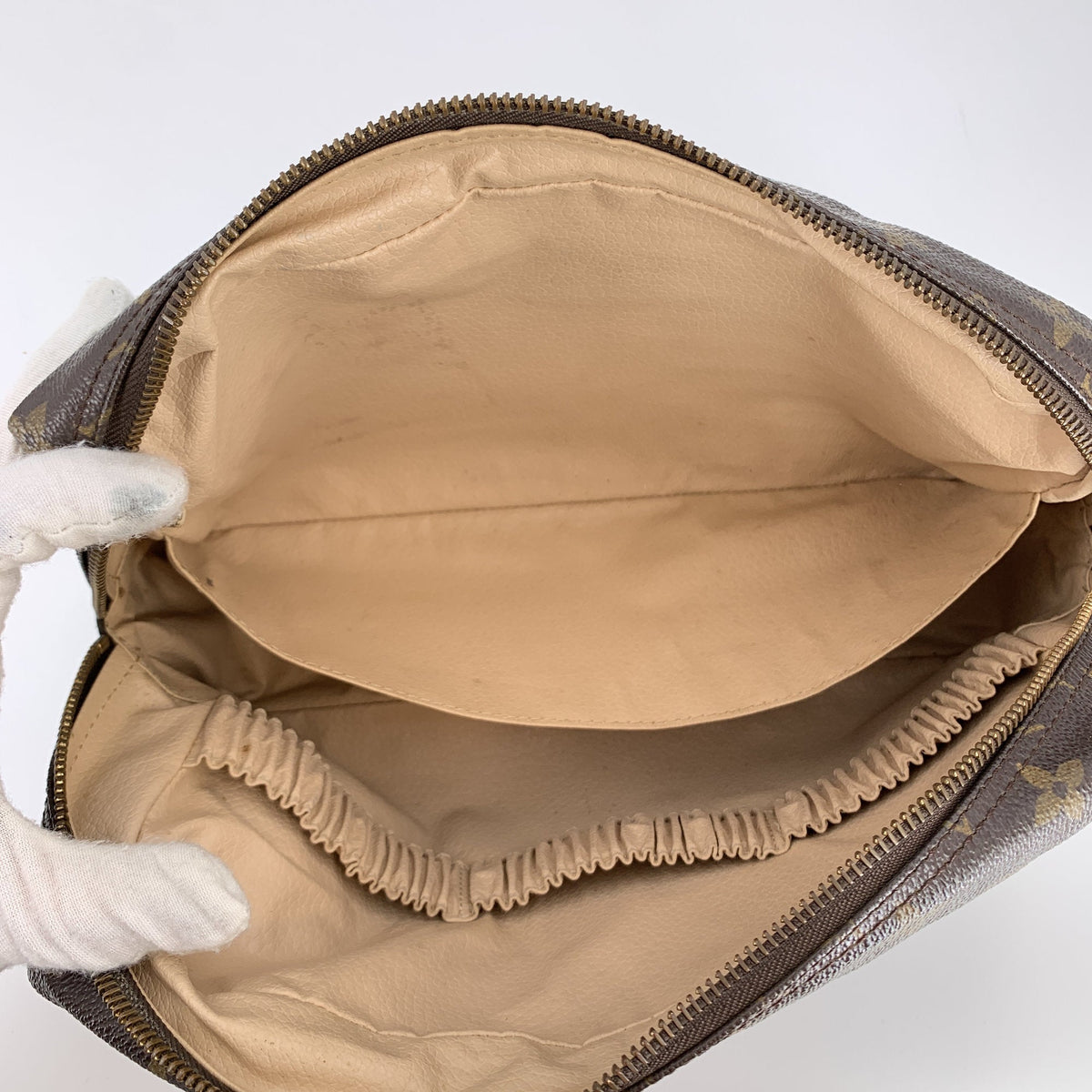 Louis Vuitton Trousse de Toilette Clutches