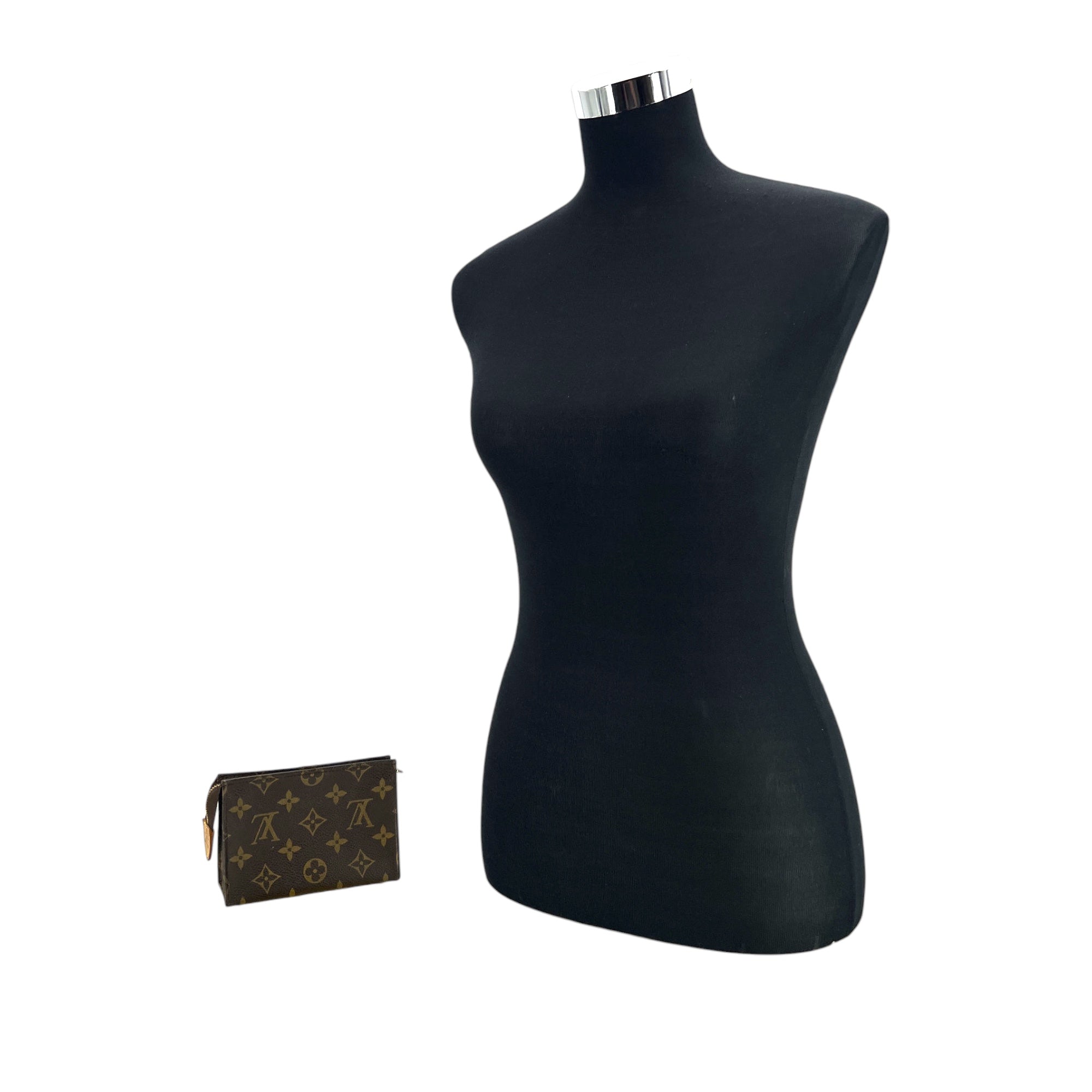 Louis Vuitton Trousse de Toilette Clutches