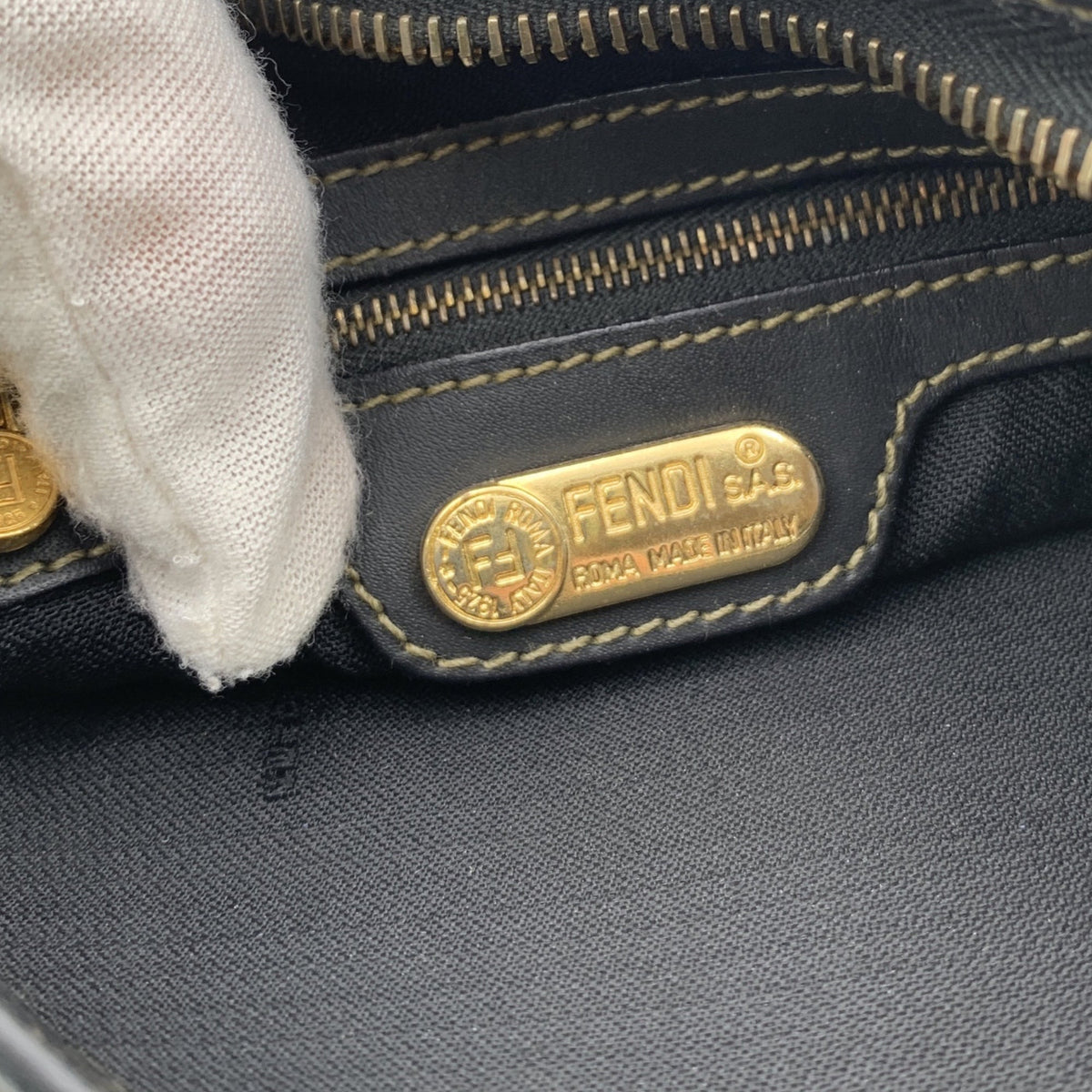Fendi Pequin Handbags