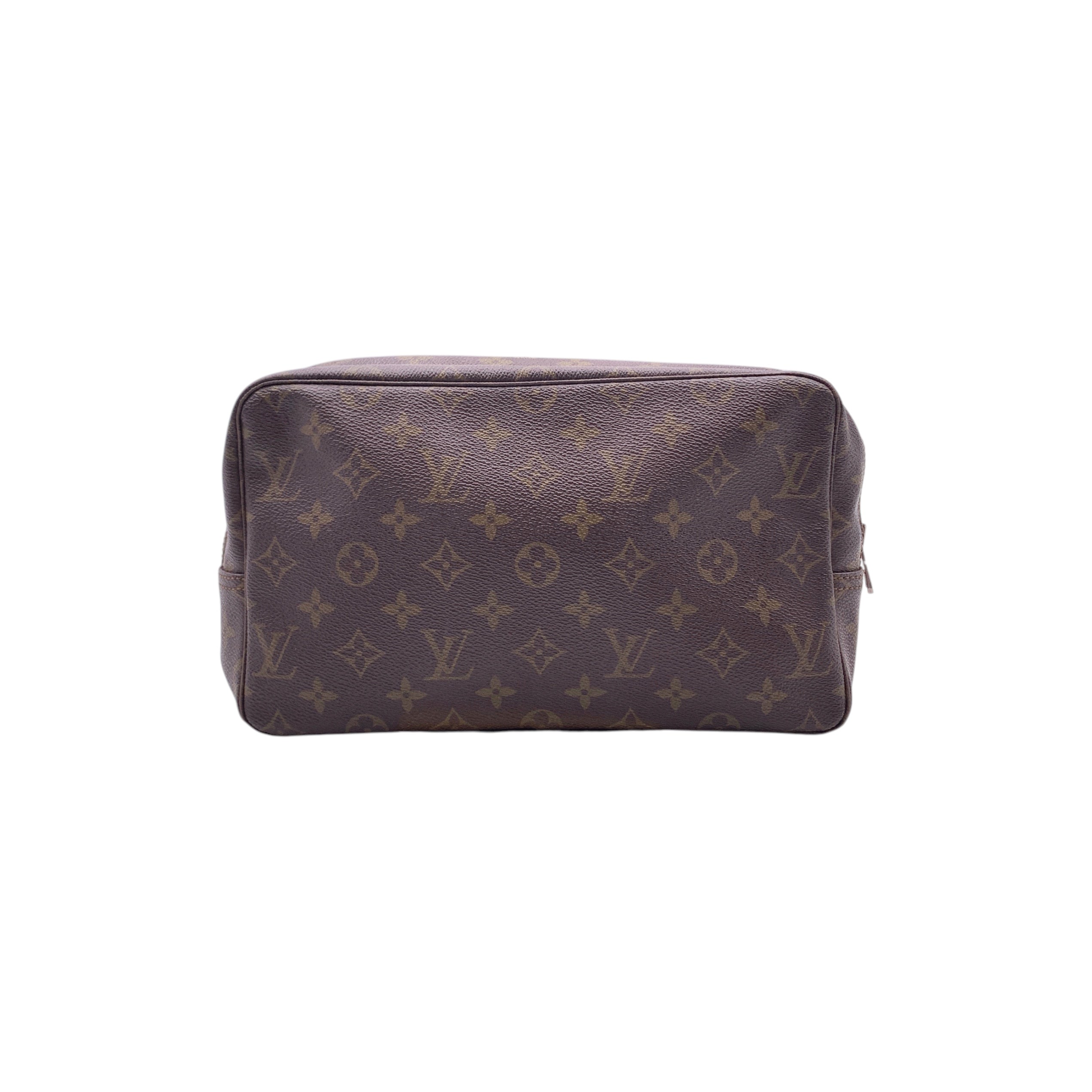 Louis Vuitton Trousse de Toilette Clutches
