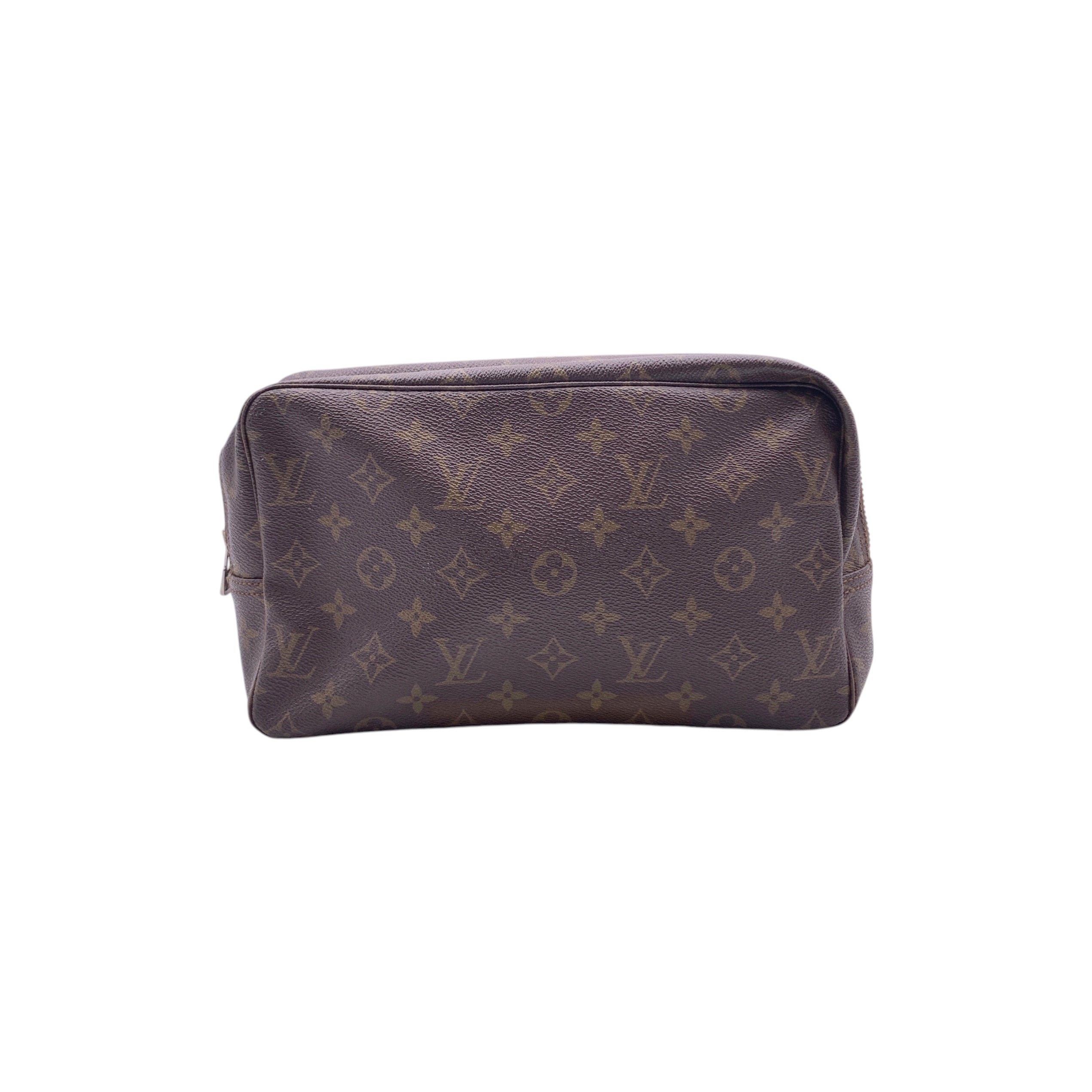 Louis Vuitton Trousse de Toilette Clutches