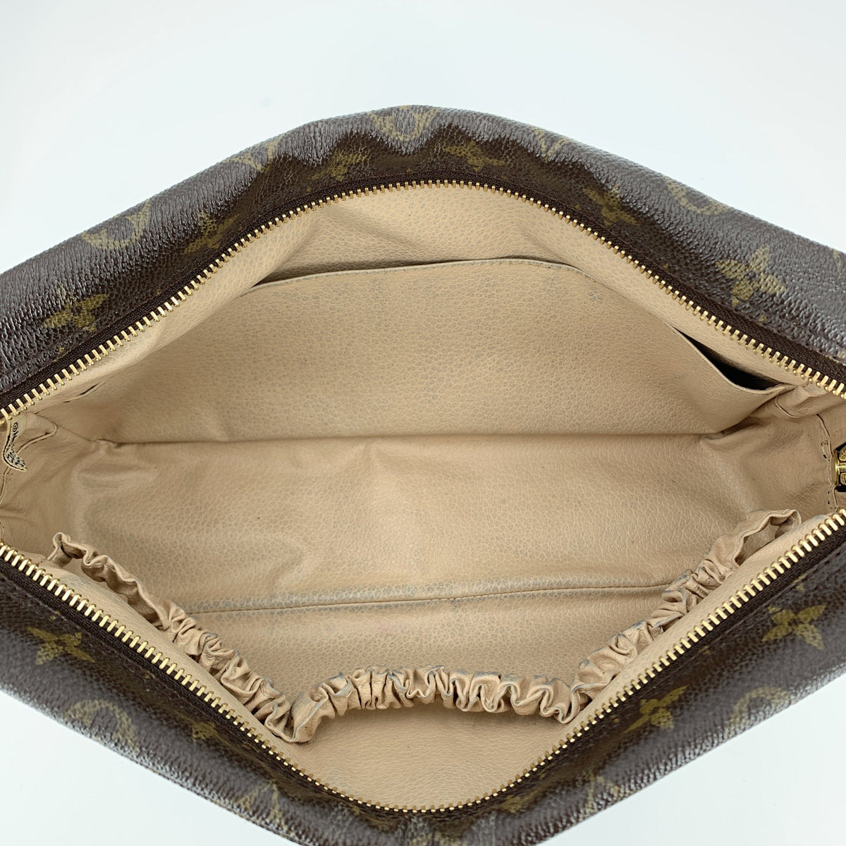 Louis Vuitton Trousse de Toilette Clutches