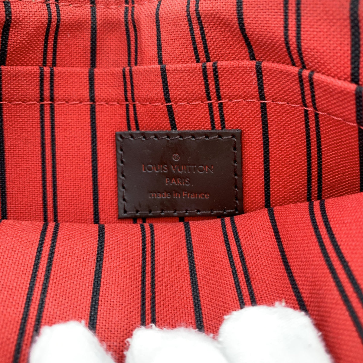 Louis Vuitton Neverfull Clutches