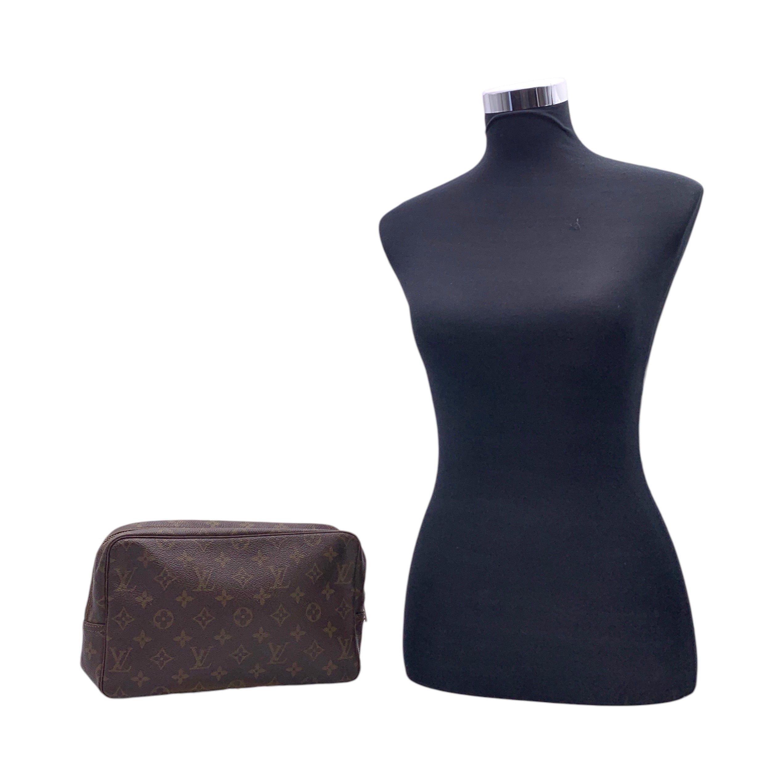 Louis Vuitton Trousse de Toilette Clutches
