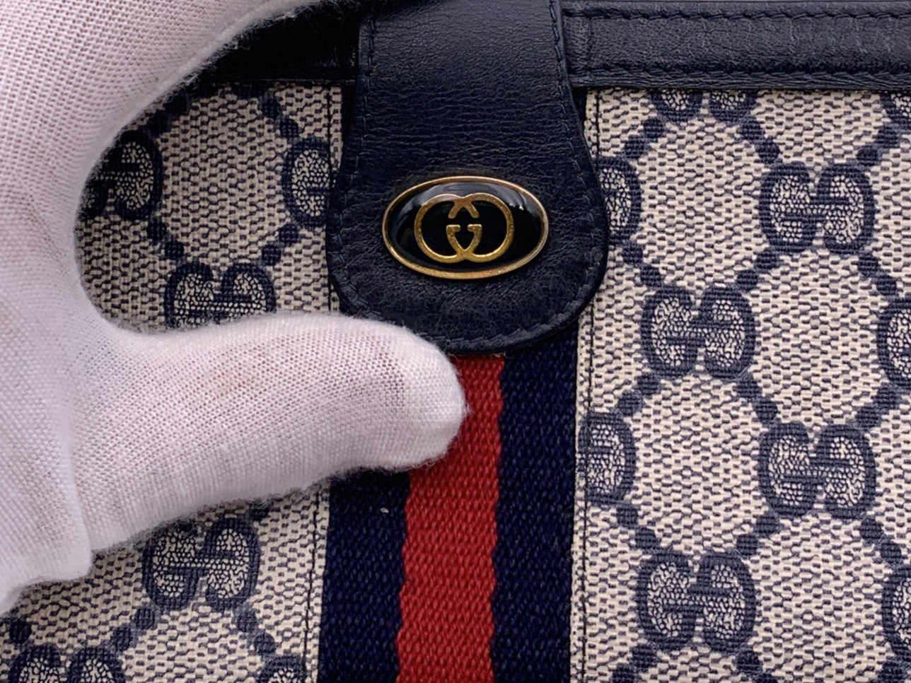 Gucci Monogram Wallets
