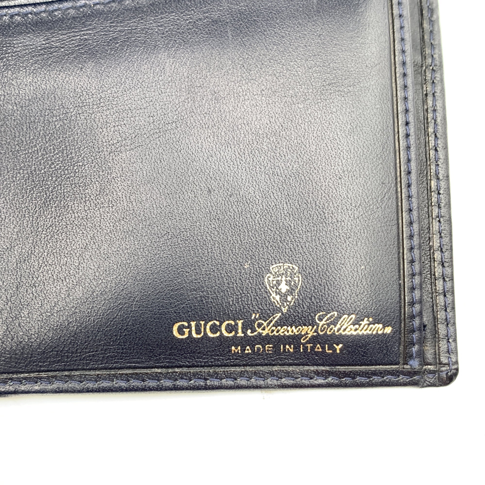 Gucci Monogram Wallets